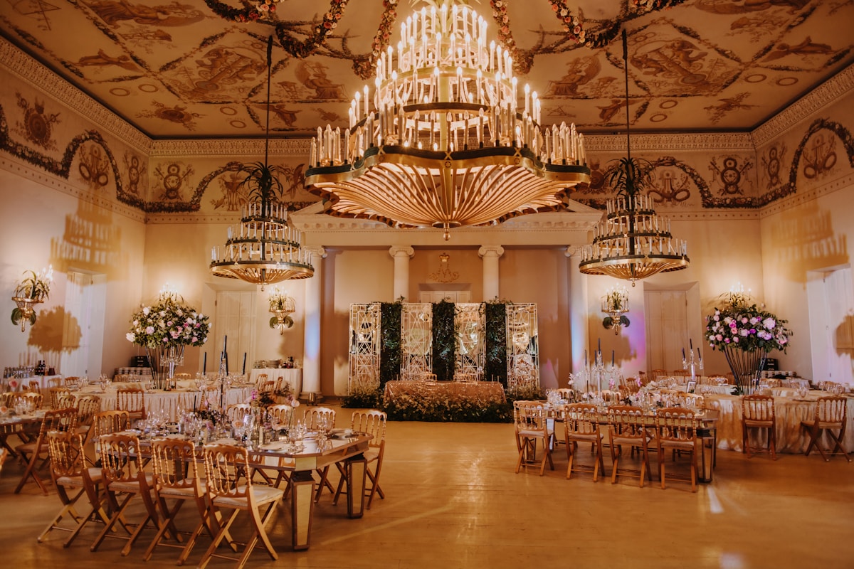 A hotel ballroom set for a wedding reception before guests arrive
