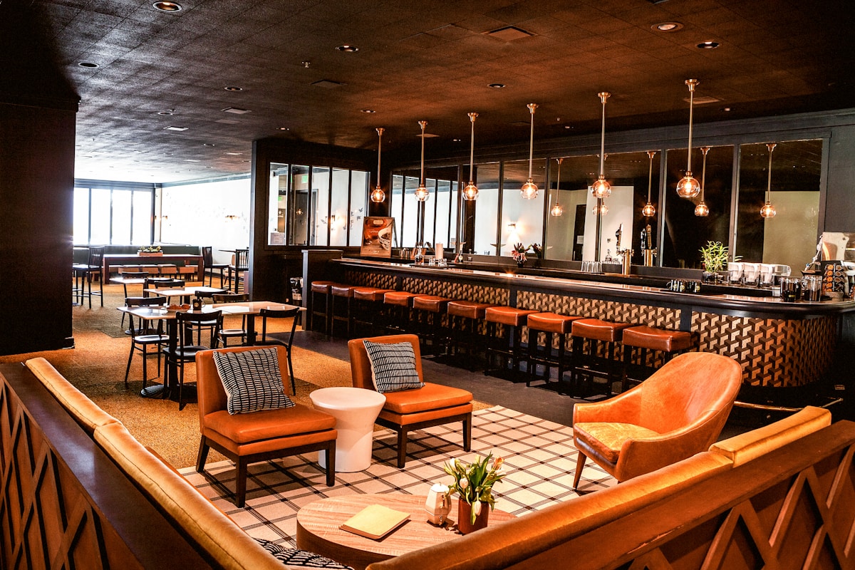 A hotel restaurant and bar at golden hour — the high-margin revenue centers AI is finally optimizing